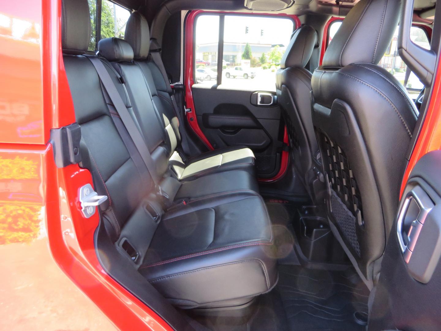 2020 Red /black Jeep Gladiator Rubicon (1C6JJTBG6LL) with an 3.6L V6 DOHC 24V engine, 6M transmission, located at 2630 Grass Valley Highway, Auburn, CA, 95603, (530) 508-5100, 38.937893, -121.095482 - Rubicon Gladiator featuring a Mopar suspension system with Fox shocks, 17" AEV wheels wrapped in 37" BFG tires, Warn Winch, Rock sliders, Cascade front license plate holder, Impact bedliner, Built Right Industries bed Molle panels, and Window tint. - Photo#56